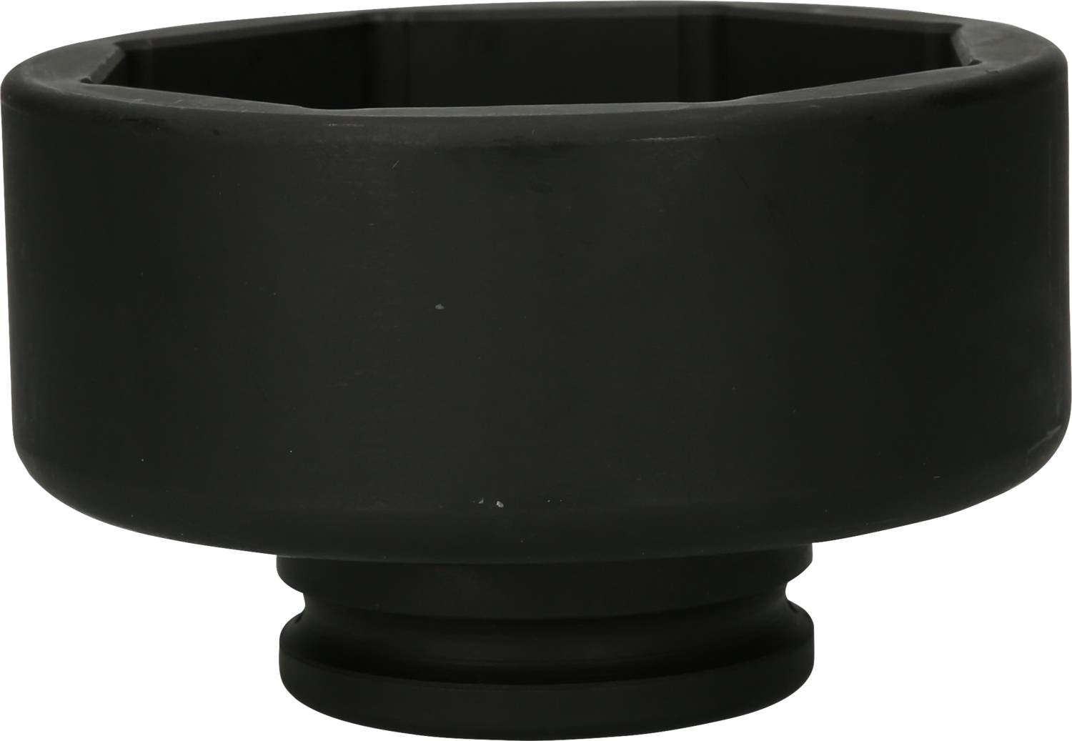 A black, cylindrical metal attachment, possibly for a tool or machine.