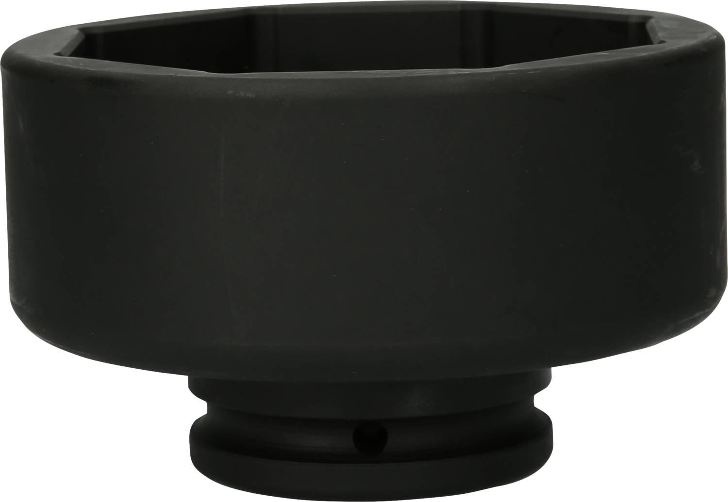 A black, cylindrical object with a broad, solid base and a hollow interior. Potentially used for technical purposes.