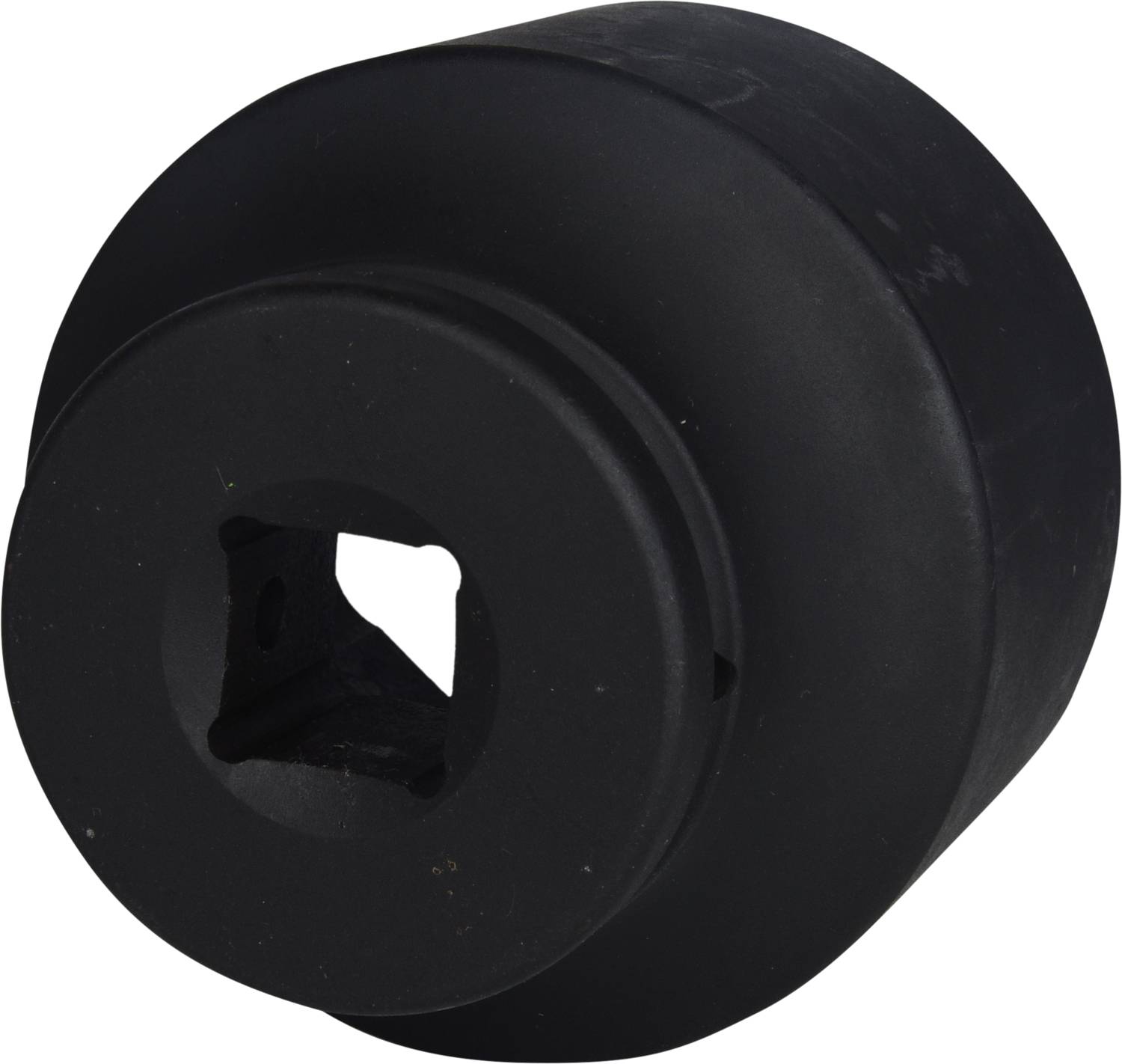 A black, cylindrical object with a square opening in the centre.