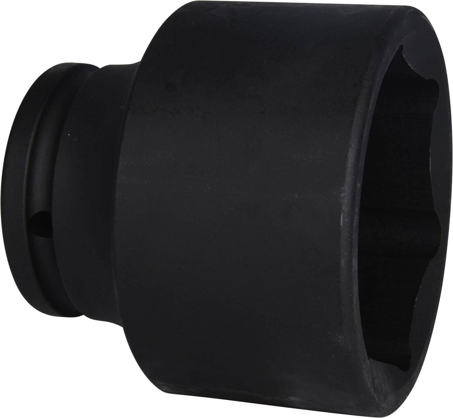 A large, black metal tool attachment, probably a hexagonal socket, with a deep opening and smooth surface.