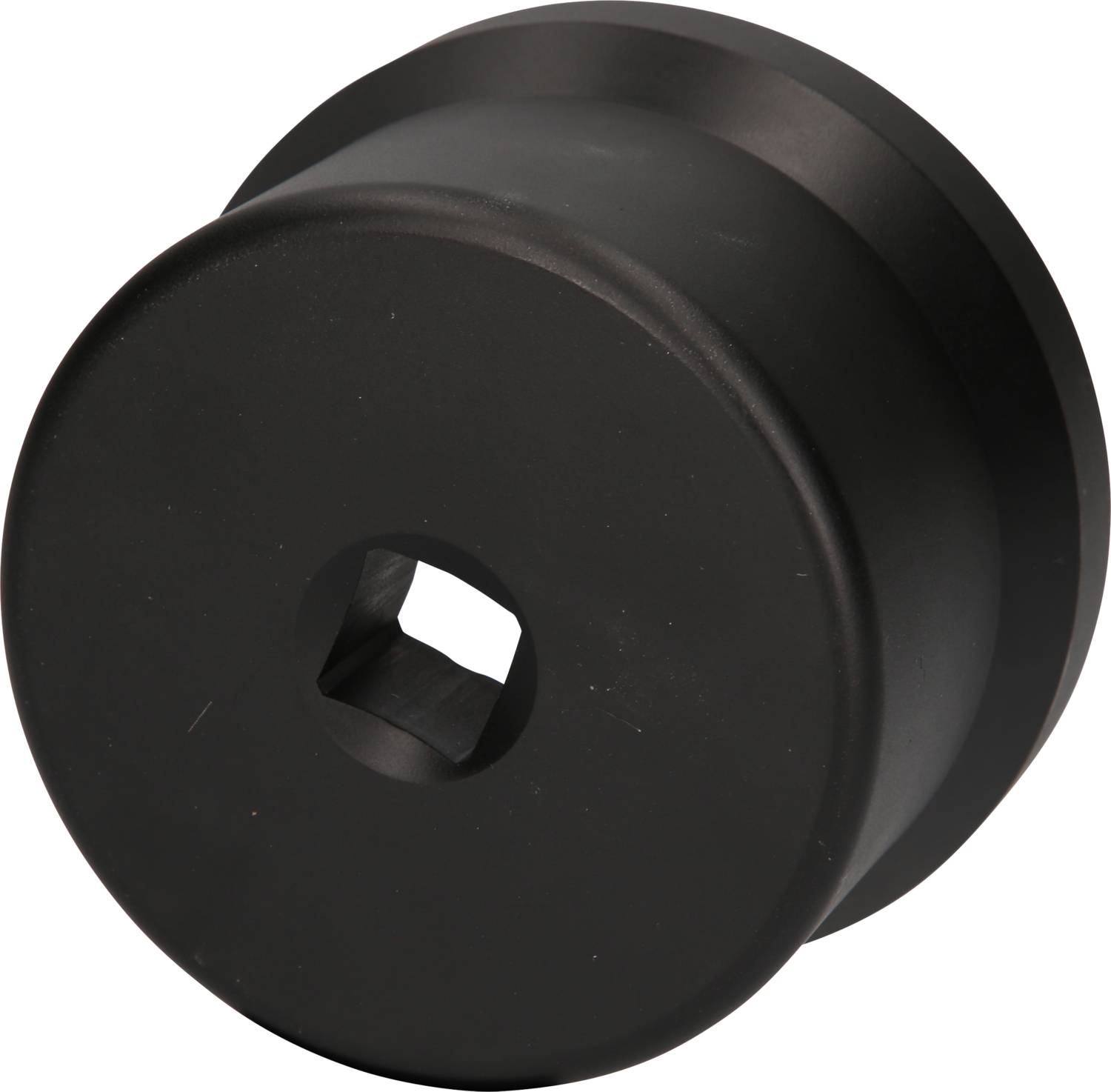 A black, round metal part with a square opening in the centre.