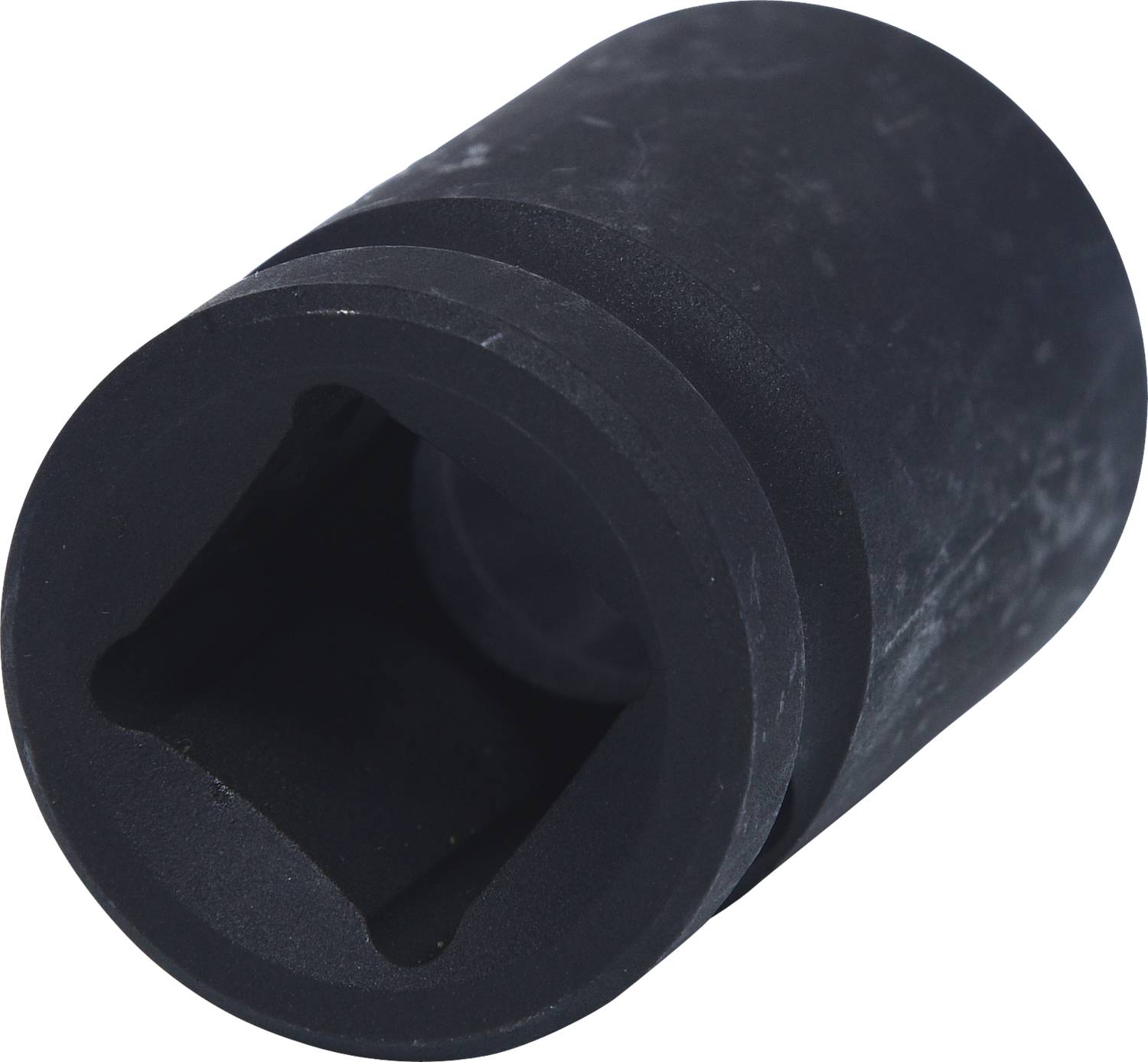 Black socket adaptor with square opening, slightly worn.