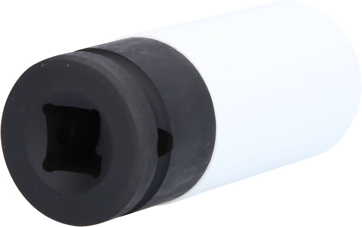 A black and white cylindrical tool part, likely a socket attachment, with a square opening on the black side.