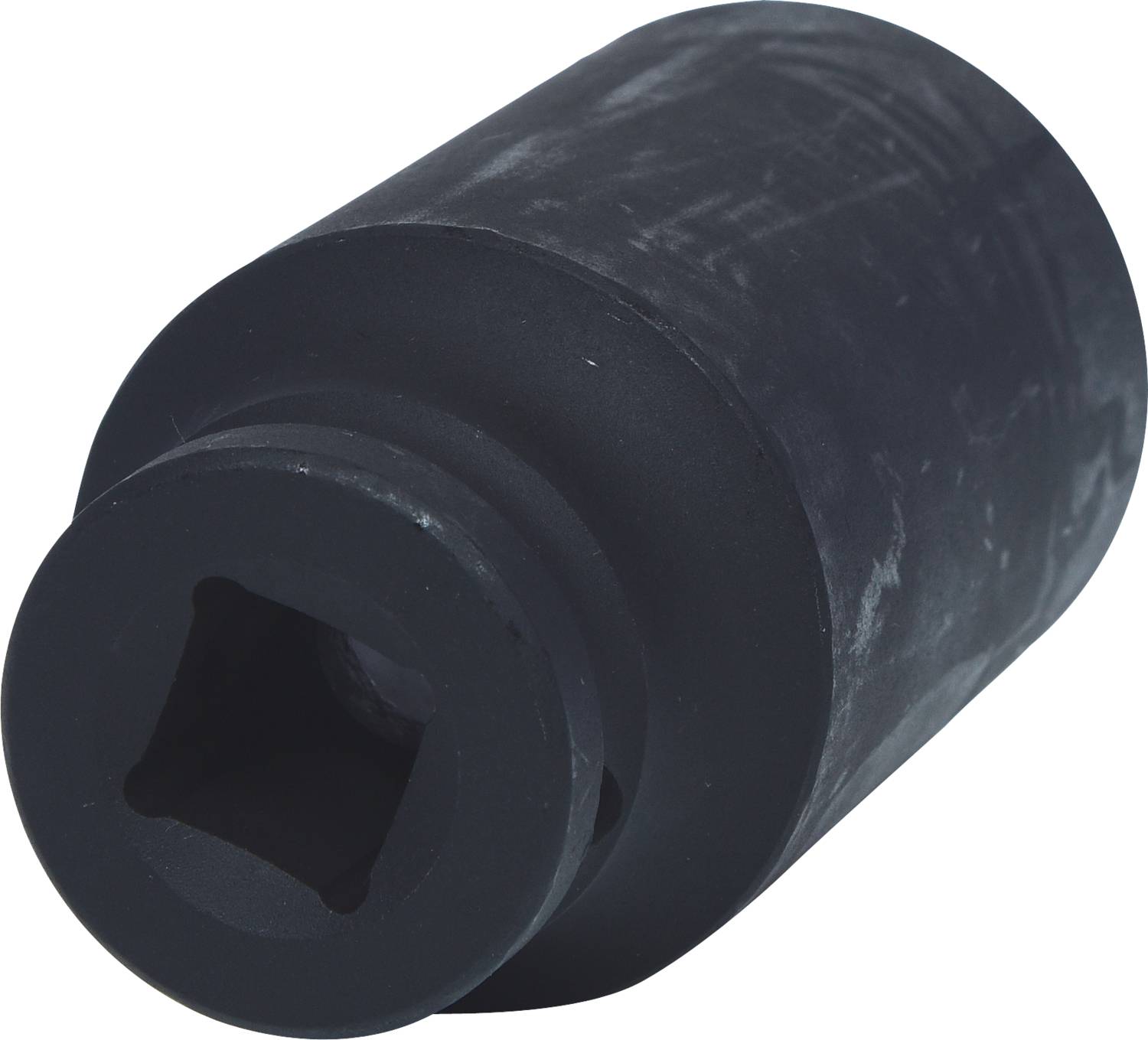 Black square-holed socket nut with cylindrical form, slightly worn. Principal component of a tool set.
