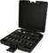 A black tool case containing a torque wrench and numerous socket wrench attachments arranged in neat rows.
