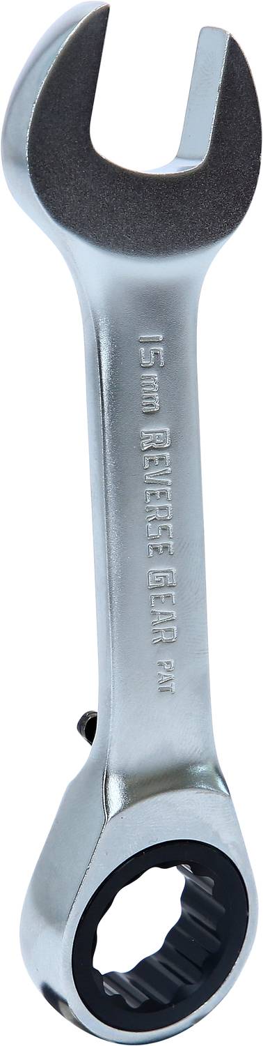 A silver spanner with an open-ended and ratchet hexagonal side, engraved with '15 mm'.
