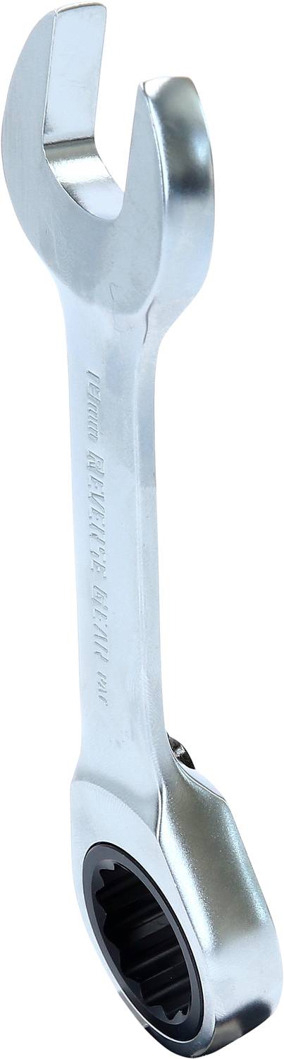 A silver metal spanner with a ratchet mechanism.