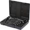 An open black toolbox with five neatly arranged spanners of different sizes inside.