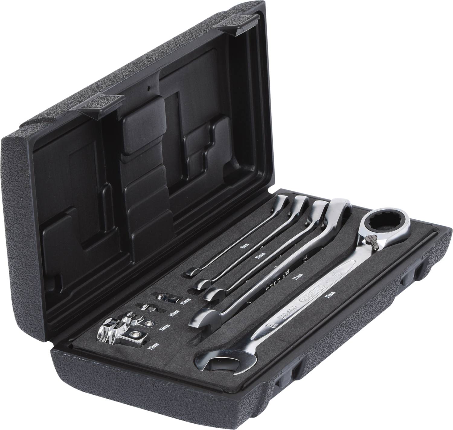 An open toolbox with several spanners and a ratchet head, arranged for easy overview.