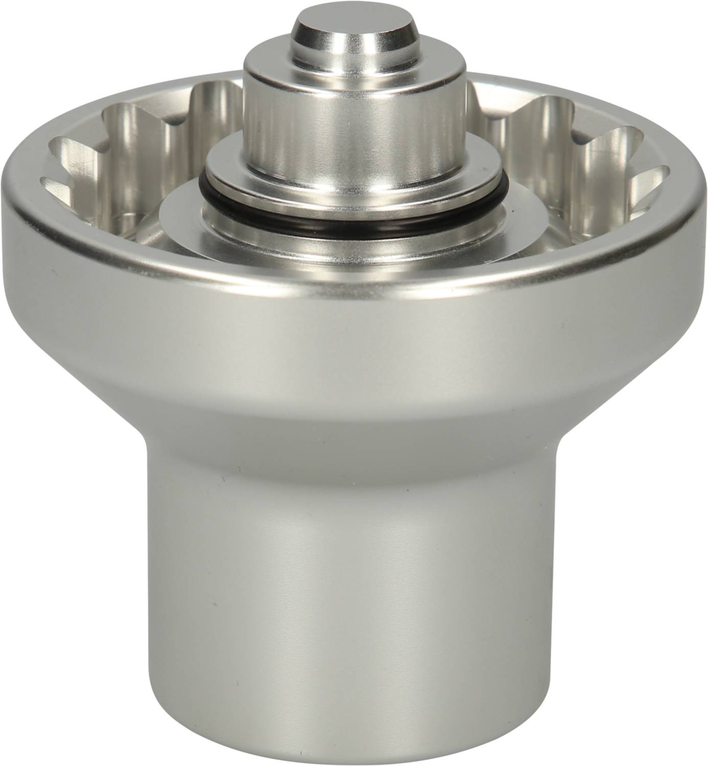 Metal machine component with a cylindrical base body and a protruding, grooved rim.