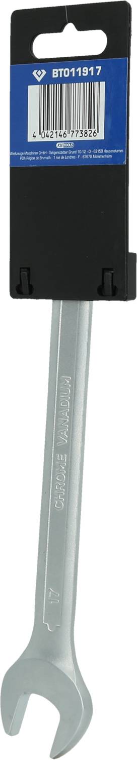 A silver spanner in its packaging, standing upright, with a black and blue label affixed at the top.