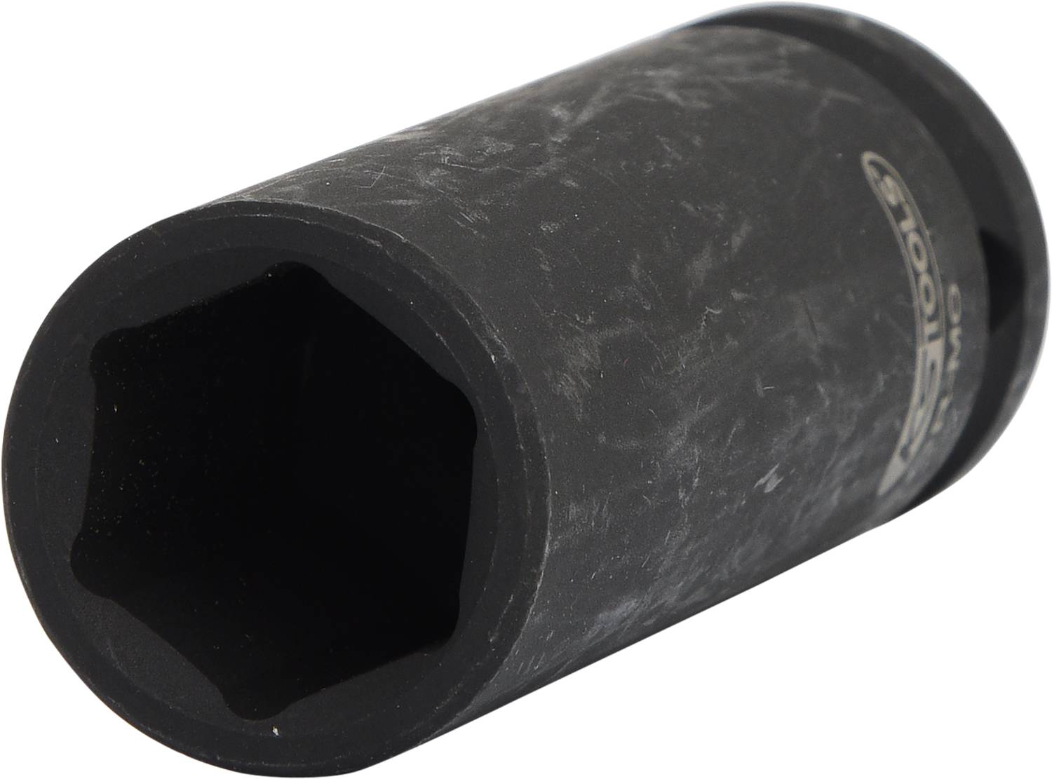 A black hexagonal socket, slightly worn, made of metal. It is used for tightening or loosening screws with matching heads.
