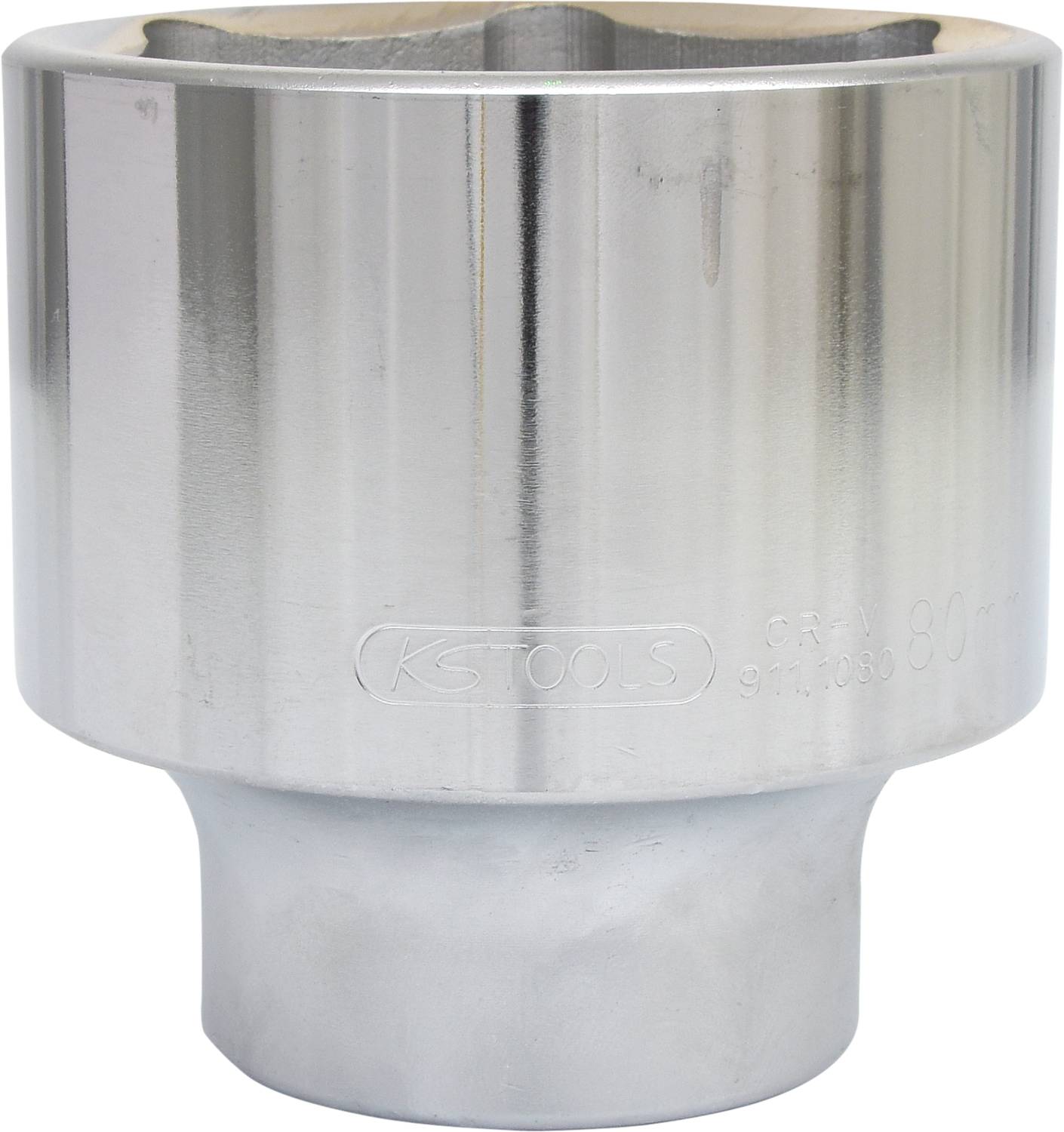 Large cylindrical metal socket tool insert with smooth surface and embossed 'KS Tools' marking.