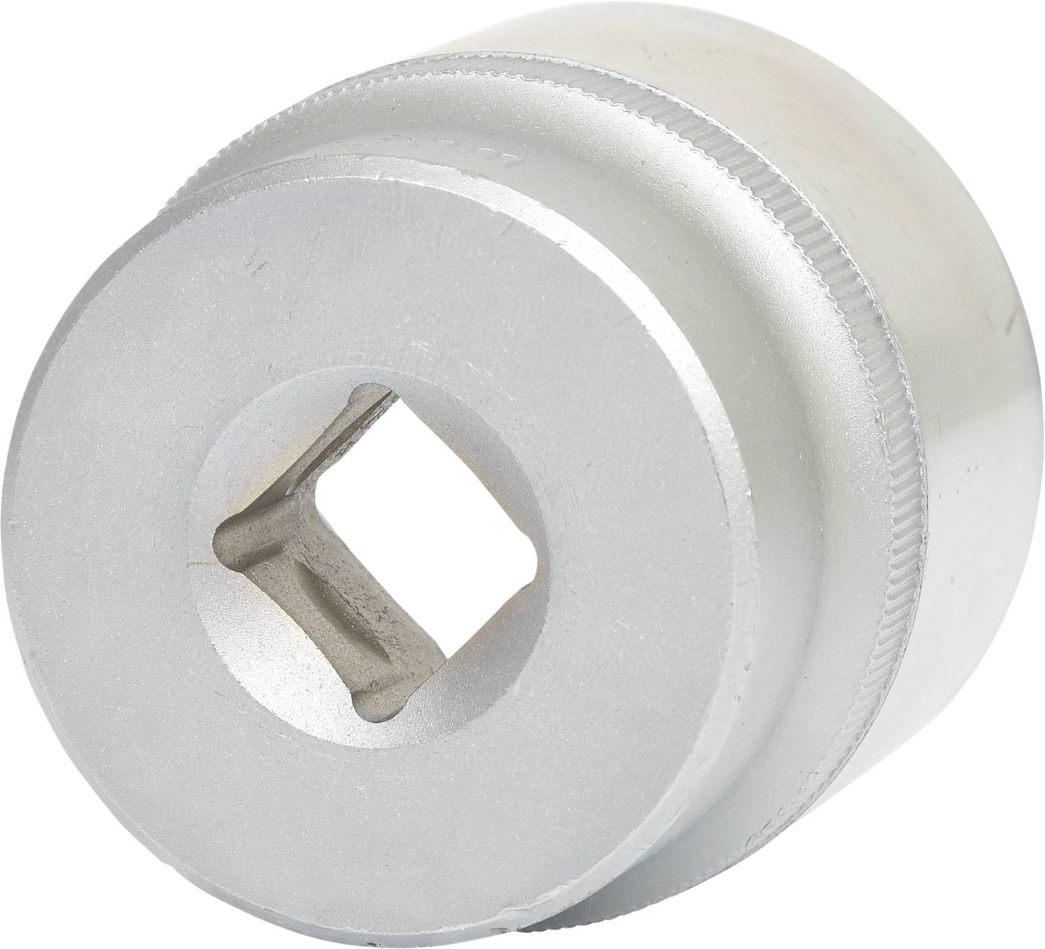 A silver socket nut with a square aperture, used for securing tools.