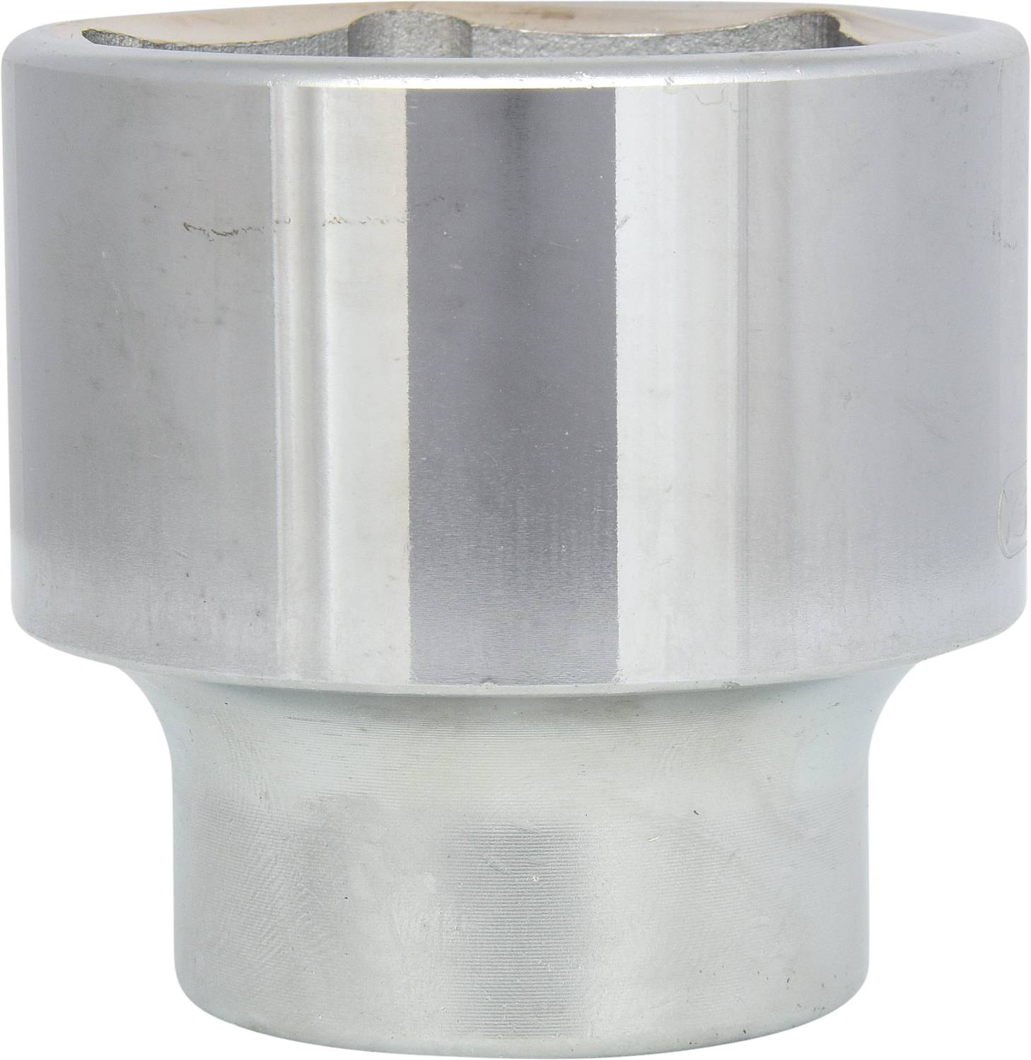 Metallic shiny hexagonal socket, cylindrical in shape, primarily used for mechanical work or repairs.