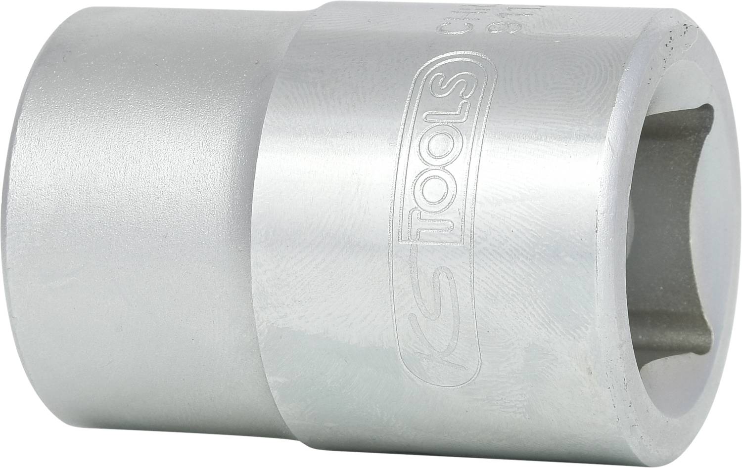 A silver metal socket attachment, cylindrically shaped, with an engraved logo. Used for screw-related work.
