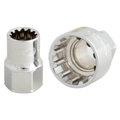 Two silver socket key attachments that are inserted into each other. On the left, a smaller attachment, on the right, a larger one.
