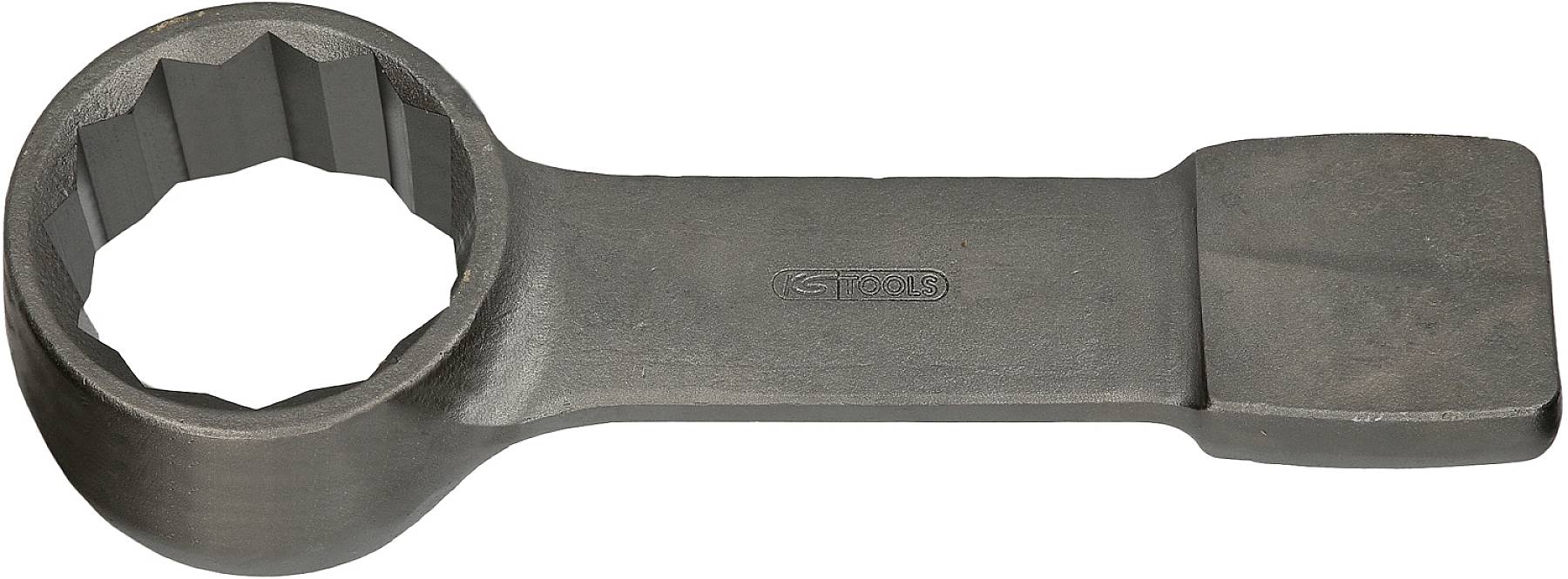 A closed ring spanner made of metal with a hexagonal opening and a flat handle, lying horizontally. Suitable for nuts.