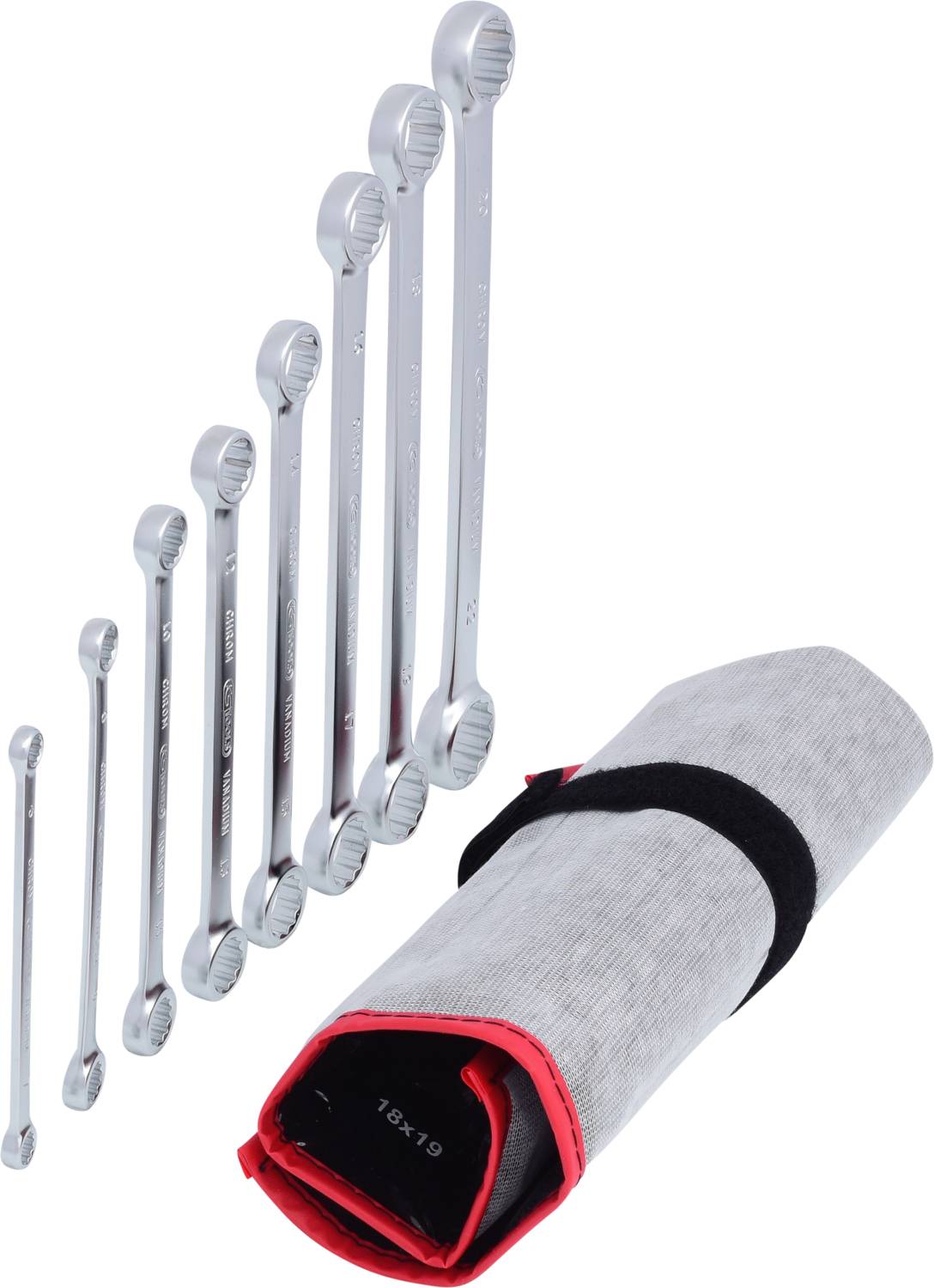 'Set of Cromargan keys in various sizes, lined up beside a rolled-up red and black tool bag.'