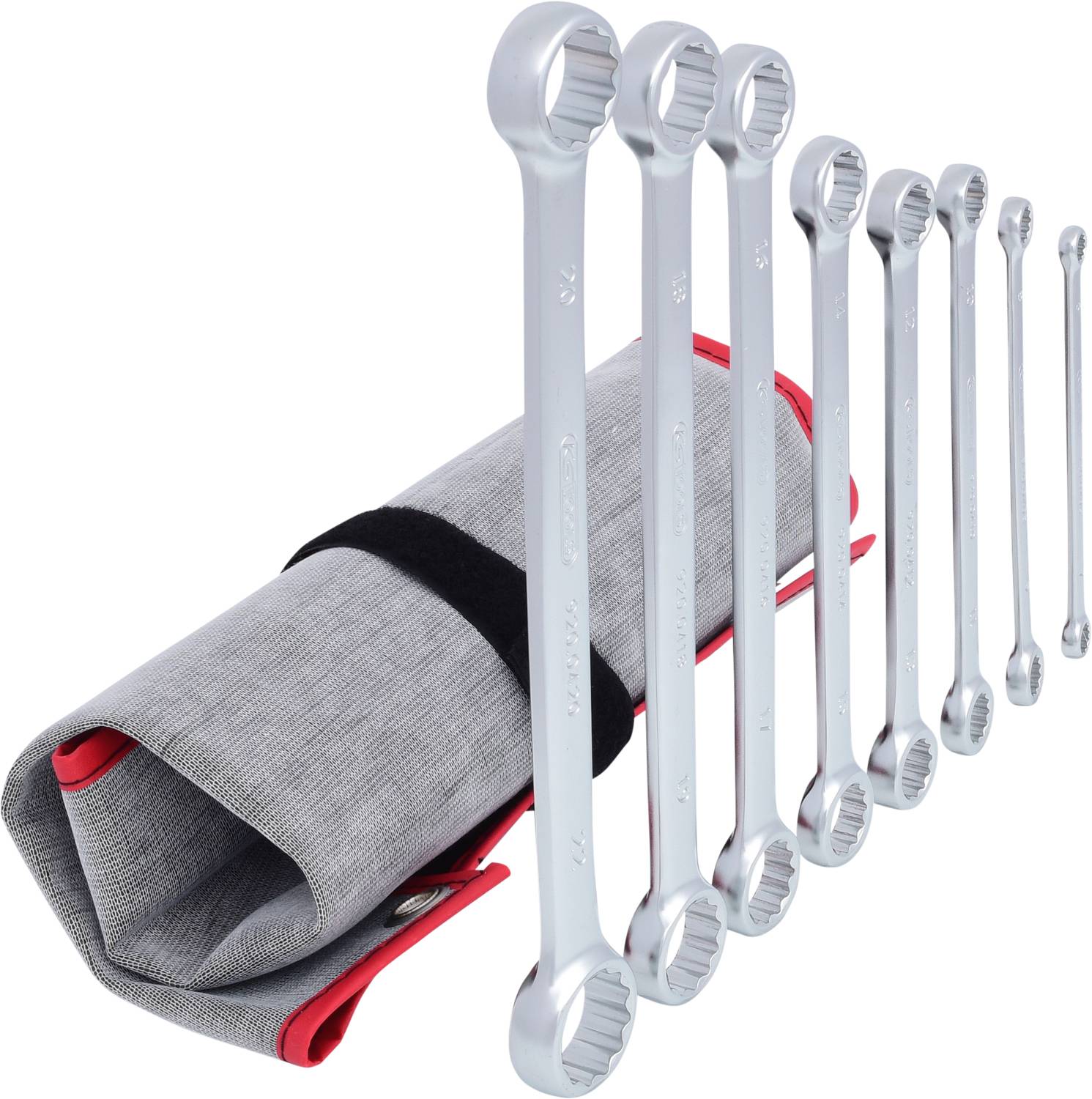 A set of spanners in different sizes, neatly arranged side by side, next to a grey, rolled-up tool pouch.