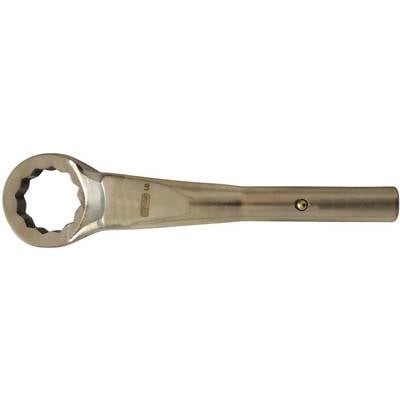 'A gold-coloured ring key with tooth insertion, likely for mechanical work, on a neutral background.'