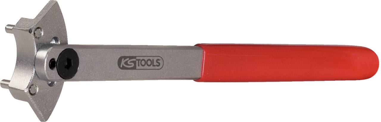 A tool with a red handle and metal head. It has two protruding pins and is used for adjusting engines.