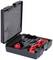 Open black hard-shell case with red and black brake caliper tool set for vehicle brake system maintenance.