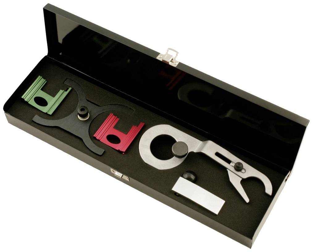 A black case with specialised tools for motorcycle repairs. Contains colour-coded metal parts for precise adjustment.