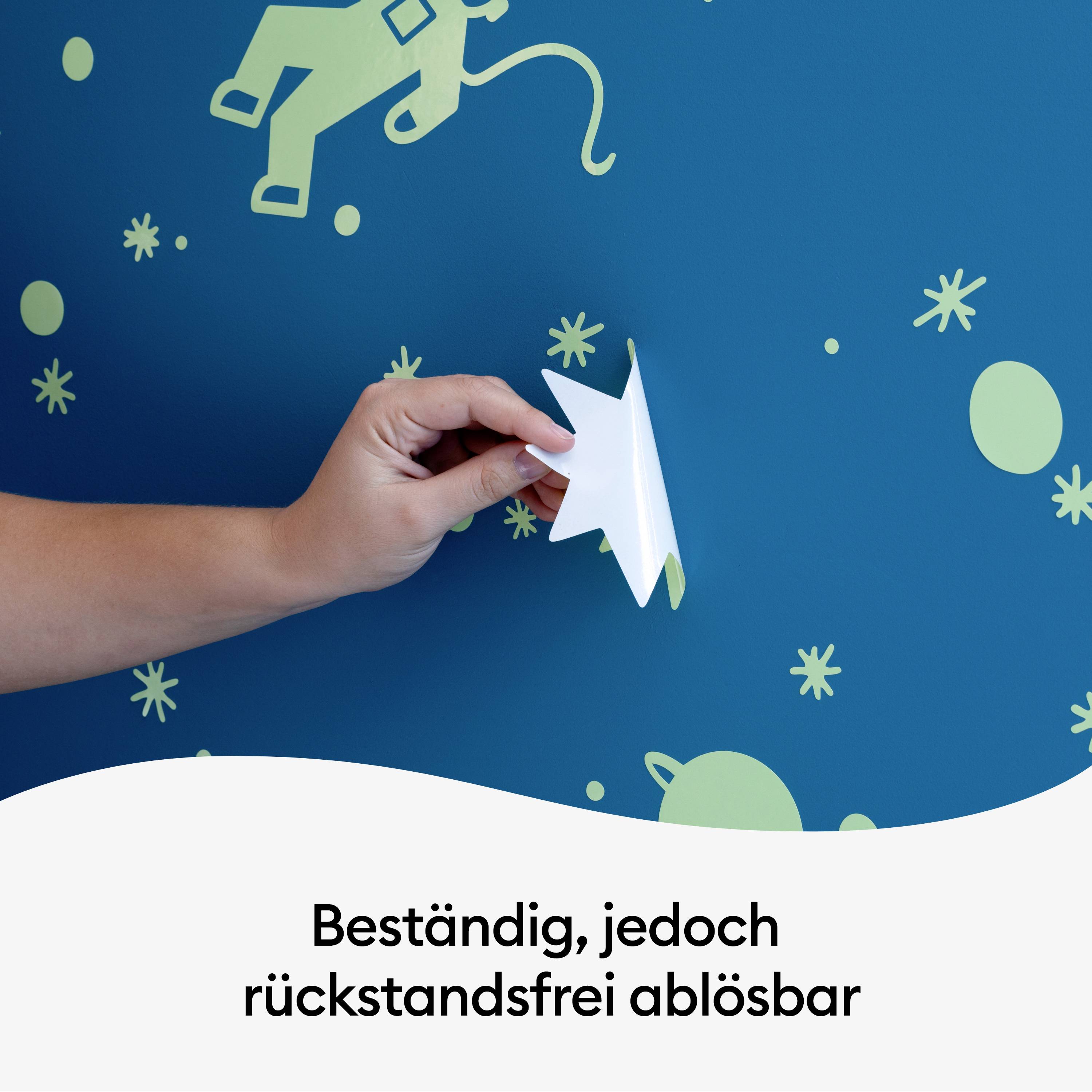 A hand demonstrates peeling a white film from a blue wall with green patterns. Text: 'Durable, yet residue-free removable'.
