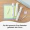 Cricut tools and materials on a table: green cutting mat, vinyl rolls, weeding hook, Cricut Joy and a roller. Text: 'Made for you. Designed to create. By Cricut.'