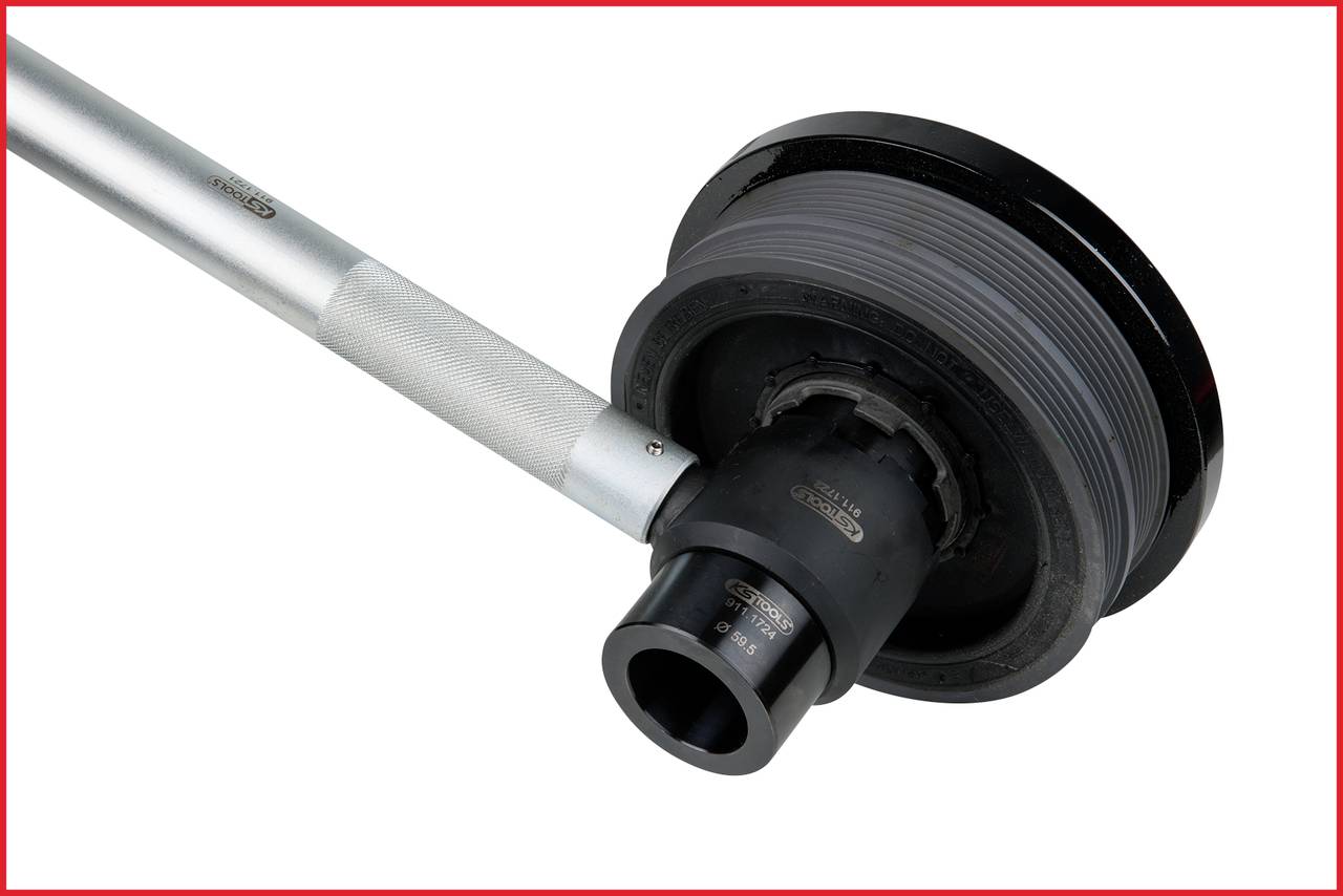 Torque wrench showing 60 Nm on the scale, connected to a nut. Primarily used for tightening bolts in mechanical engineering.