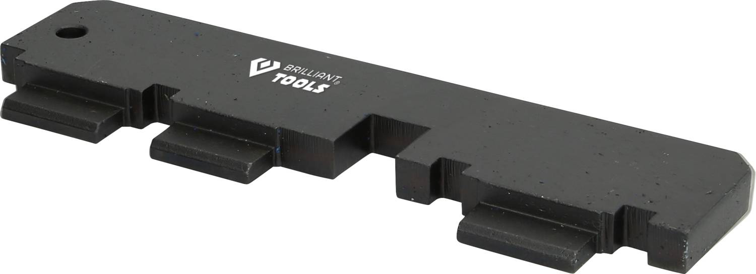 Metallic camshaft sprocket adjustment tool with multiple teeth for precise alignment during engine repair.