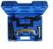 An open blue toolbox displaying various metallic tools, including a key-shaped component, screws, and brackets.