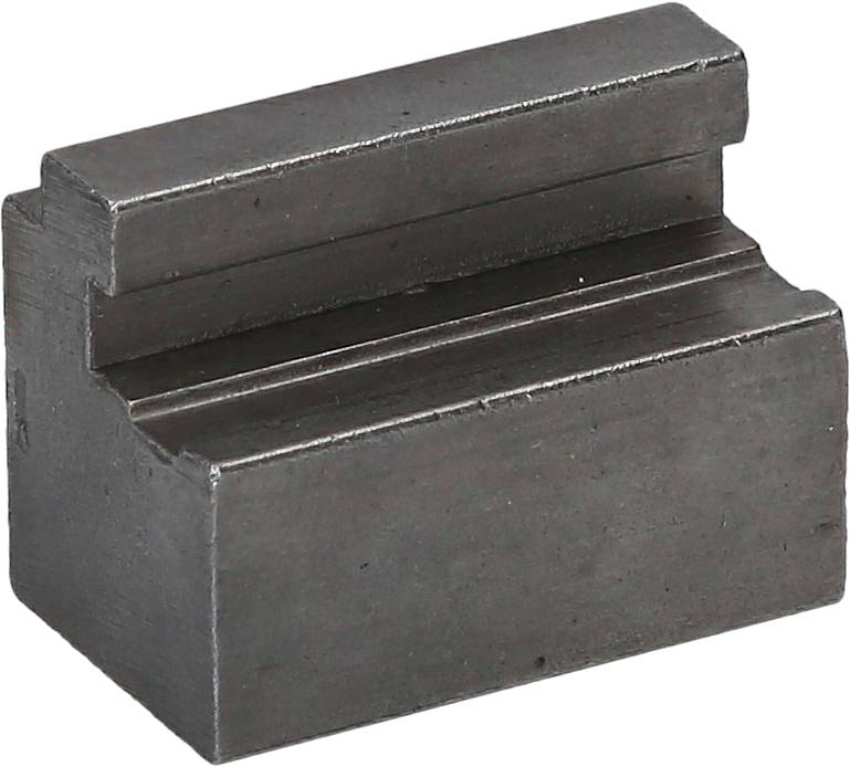 Metal block with U-shaped groove, possibly part of a tool or machine construction.