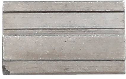 Metal block with two parallel grooves, horizontally positioned, showing clean edges and a matt grey surface.