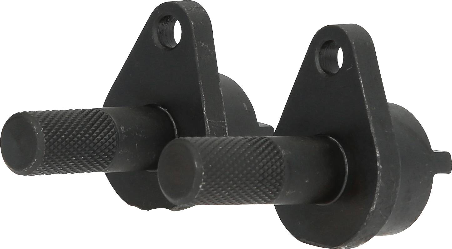 'Two black metal tools with a round, ridged grip surface and a flat, semi-circular base. Each has a hole for attachment.'