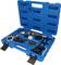 Toolbox made of blue plastic with various tools and accessories such as measuring device, spanner, and adapters, open.
