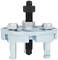 Metal puller with multiple screws and bolts. It is used to remove stuck parts from a shaft.