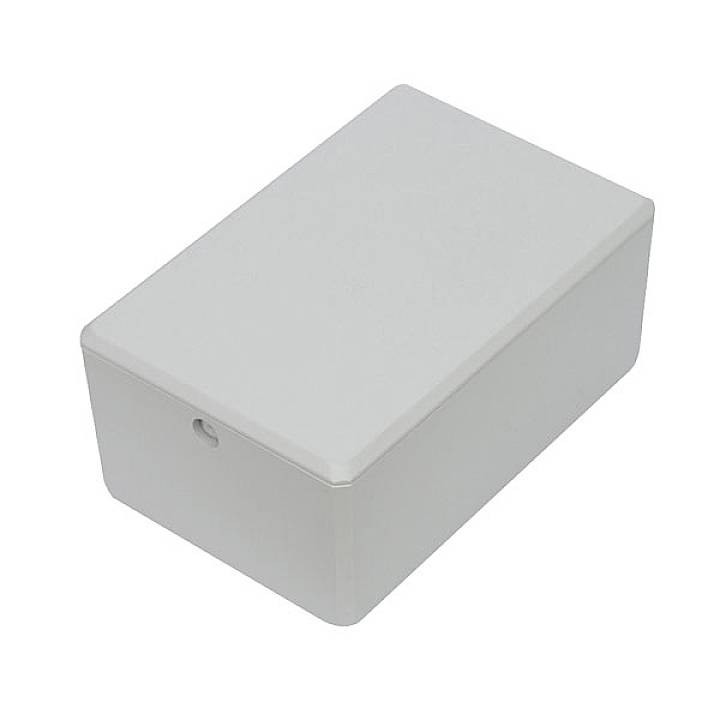 Rectangular white casing with rounded edges, possibly an electronic device or a protective box.