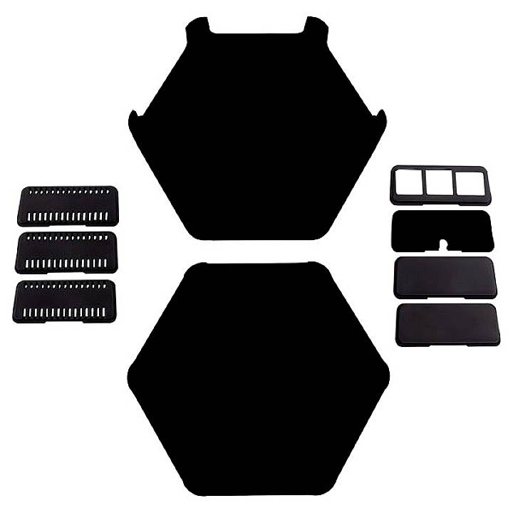 A set of six black plastic coasters in various shapes, symmetrically arranged on a white background.