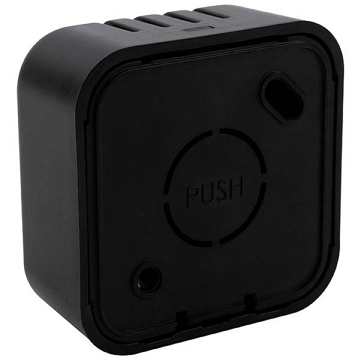 Black square soap dispenser with 'PUSH' printed on the front, a small hole in the bottom right corner.