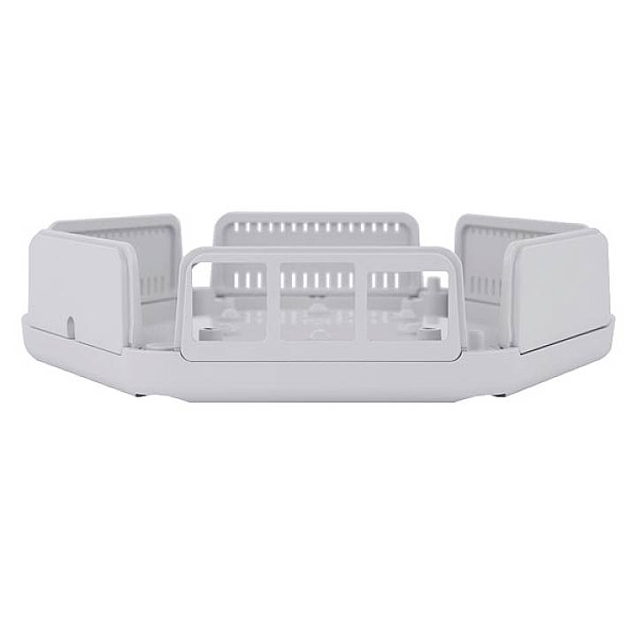 A white, hexagonal Wi-Fi router with multiple ventilation slots and rounded corners, viewed from the front.