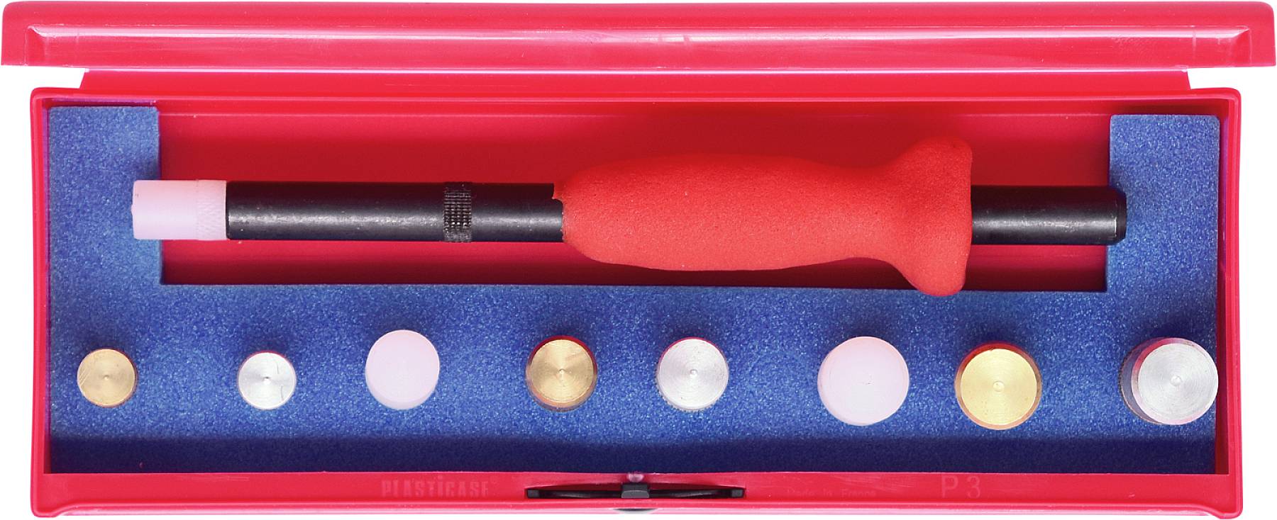 Red tool set with seven round stamps of various sizes and a long black handle with a red grip piece.