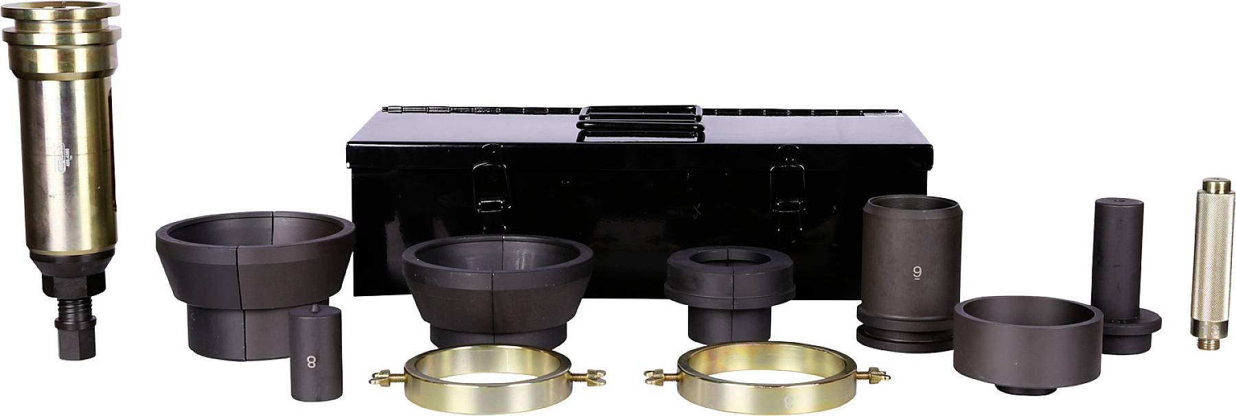 Various metal and plastic tools arranged on a surface with a black toolbox in the background.