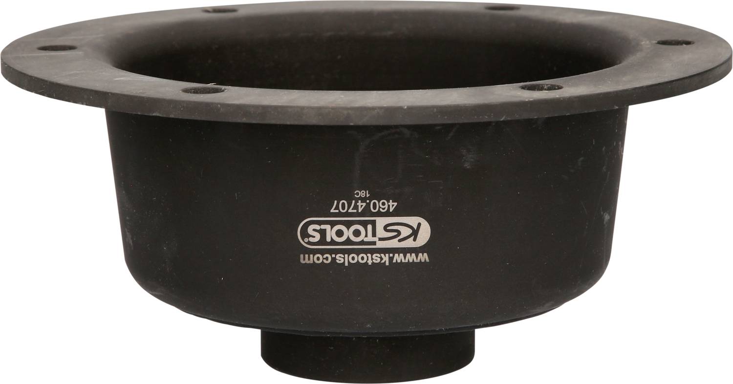 A black, round KS Tools workpiece with a flange and opening, possibly a valve or adapter, with the inscription 'www.kstools.com'.
