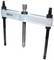 Three-bolt metal puller, used for removing components such as bearings or gears from a shaft.