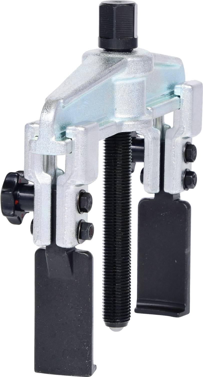 Metal puller with two black jaws and a central bolt at the top. Used for removing stuck parts.