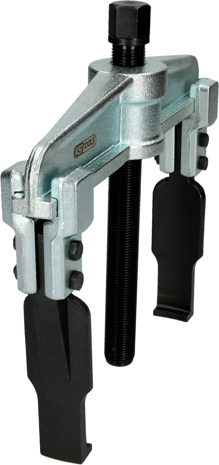 Two-armed metal puller with a black screw in the centre. Used for removing bearings or gearwheels.