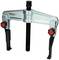 Two-arm puller tool with screw mechanism, designed for removing bearings or gears in mechanical engineering applications.
