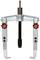 An adjustable two-arm puller with a central spindle, suitable for removing gears or bearings.